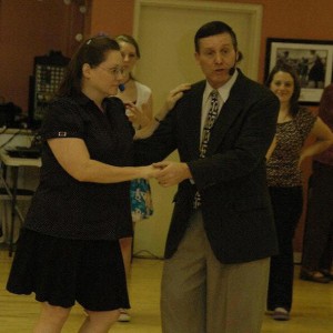 Mike and Mary teaching swing dance lessons