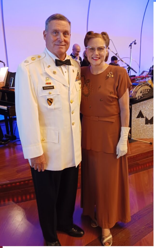 Mike wore his military dress jacket for one of the nightly dances, and Mary a 1930s evening gown.